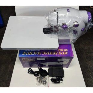 Міні швейна машинка 4 в 1 з педаллю та адаптером Mini Sewing Machine FHSM 202 з дошкою ws29598 фото
